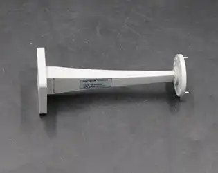 How does WG Transition improve the efficiency of waveguide-based communication systems?